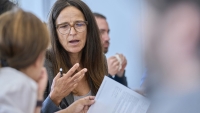 CPTR faculty member speaking with colleagues